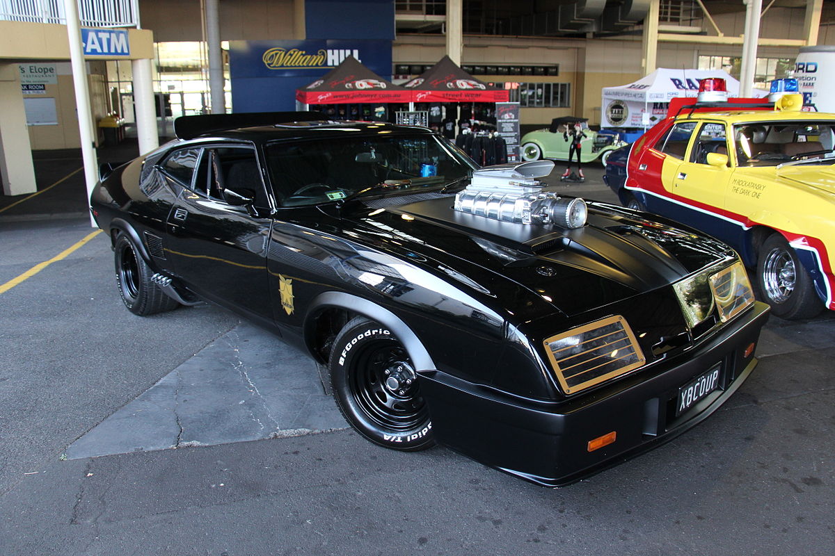 1200px-1973_Ford_XB_Falcon_Hardtop_Mad_Max_Tribute_(16862243577).jpg