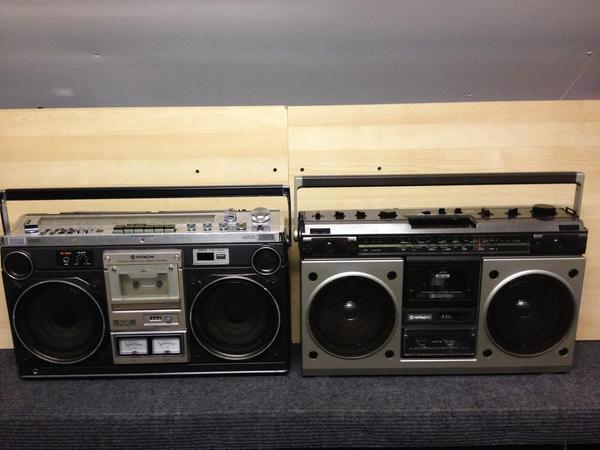 164 Hitachi on the right with chrome woofer dust covers and black background vu meters LIKE !!
